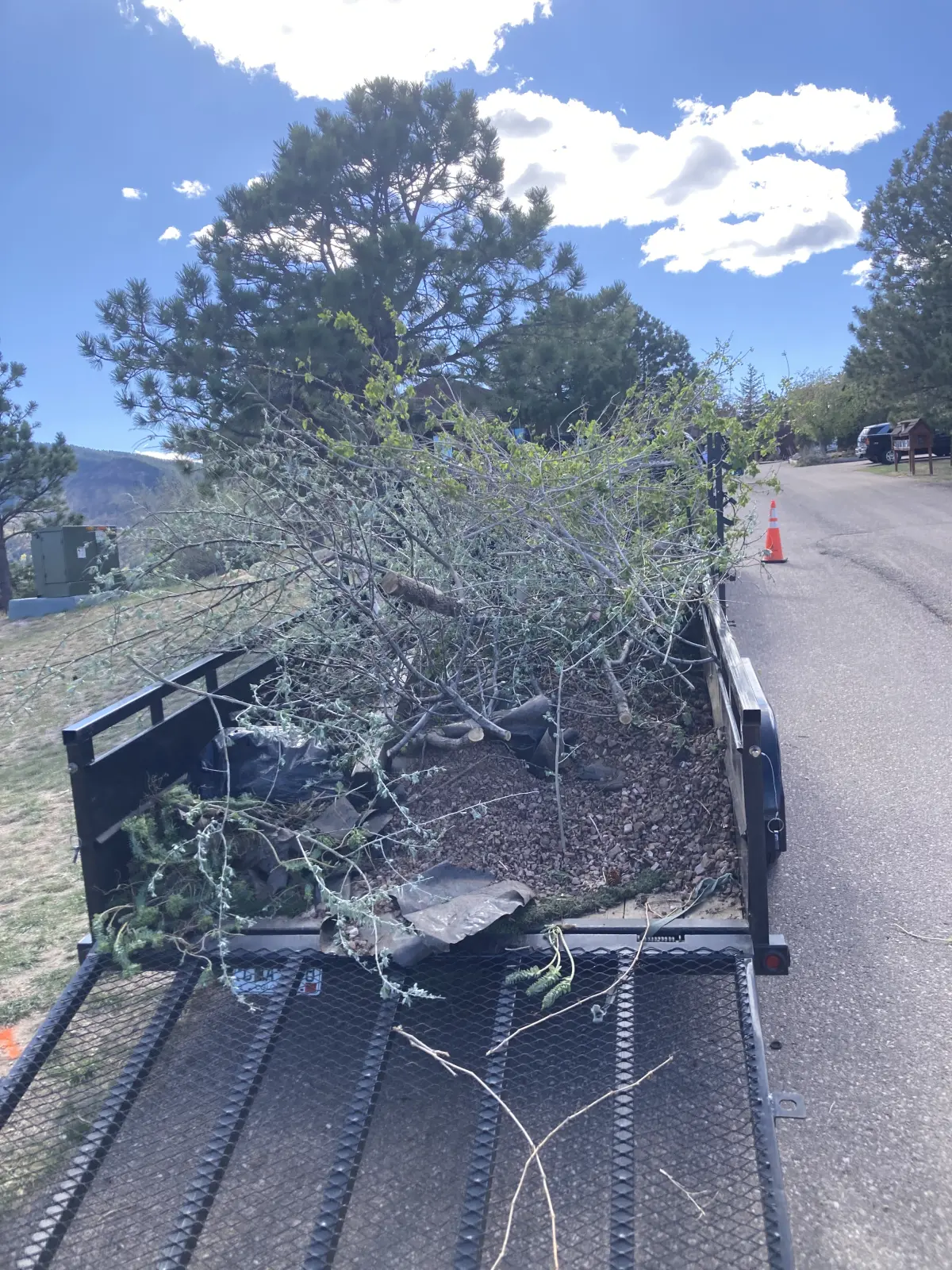 JLS field mowing equipment on a large Colorado property