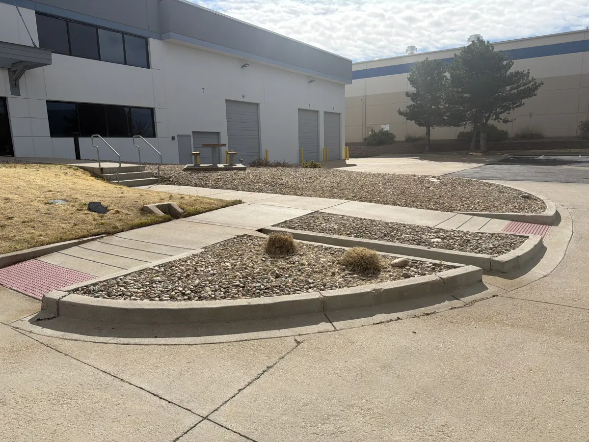 Decorative rock and mulch installation at a Colorado commercial property