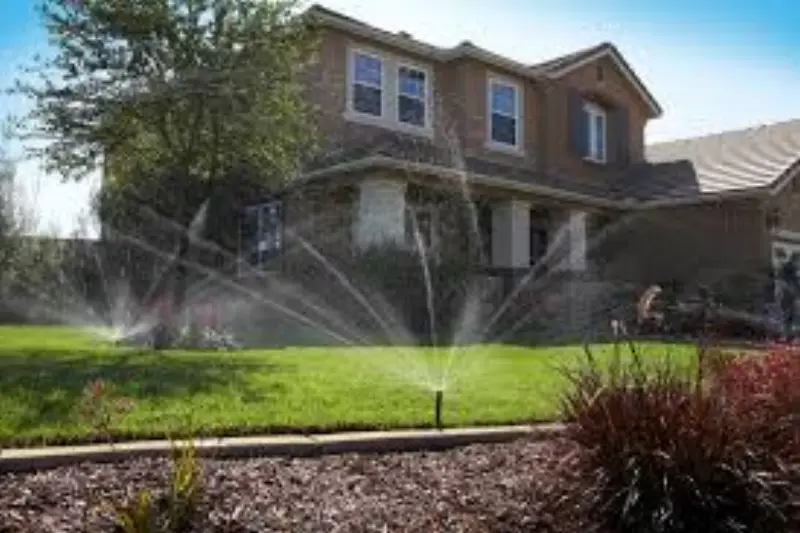 Sprinkler irrigation system running on a Denver commercial property