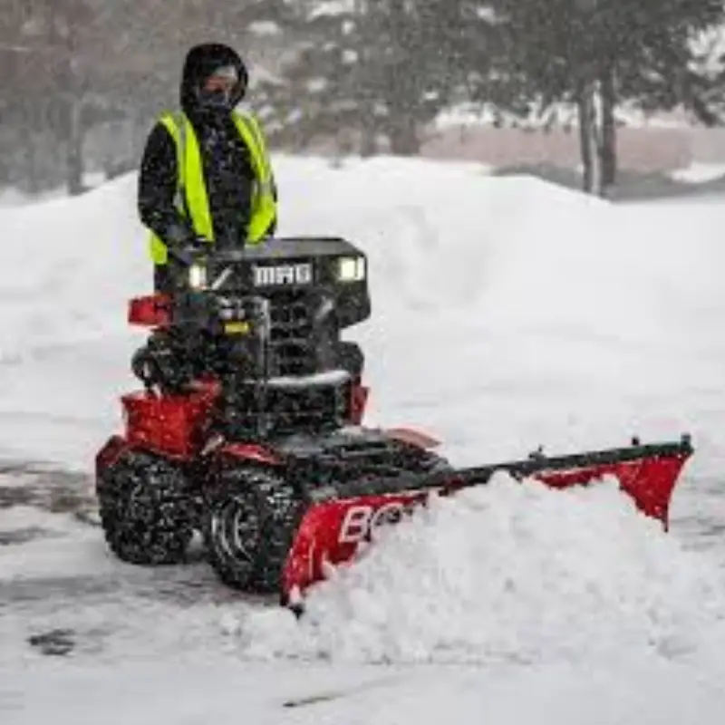 Snow removal service clearing a Castle Rock commercial parking lot